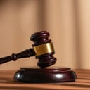 A judge's gavel and a stand