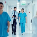 Doctor and nurse walking down a hospital hallway