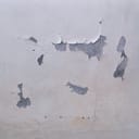 close-up of a white wall peeling