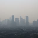 panoramic view showcasing air pollution in Jakarta city