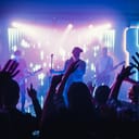 Band performing live music in front of an audience