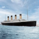 Colorized photograph of the RMS Titanic preparing to depart from Southampton to go to pick up passengers at Cherbourg, before starting her voyage to New York