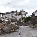 Exterior of a house damaged in an earthquake