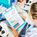 Researcher looking at a data sheet