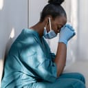 Exhausted nurse takes a break