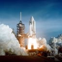A space shuttle launch from the launchpad