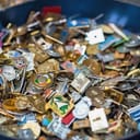 A pile of various badges