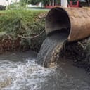 Dirty sewage from the pipe, environmental pollution