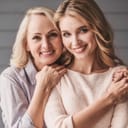 Mother and daughter in a loving embrace