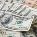 Close up heap of one hundred dollars, selective focus. Dollars, the us money background.