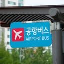an airport bus sign