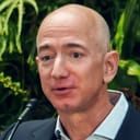 Portrait of Amazon founder Jeff Bezos talking into a microphone