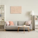 chic living room with a comfortable sofa, a trendy coffee table in front of it, and white shelves on sides