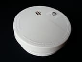 Smoke detector on a black surface
