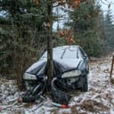 car crashed into a tree in icy conditions