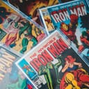 several old comics that are still sealed in their original packaging 
