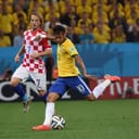 Neymar kicks ball while playing for Brazil against Croatia.