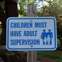 Sign saying "Children Must Have Adult Supervision"