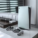 Playstation 5 and two controllers beside a TV