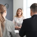 Blonde woman during an interview.