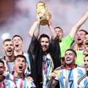 Lionel Messi of Argentina lifts the FIFA World Cup trophy in 2022.