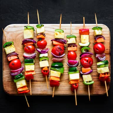 skewer (【Noun】a long piece of wood or metal used for holding pieces of food  while they are cooking ) Meaning, Usage, and Readings
