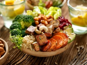 A bowl with various vegetables combined into a healthy meal