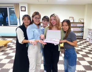 A group of Japanese students members of the Education for Afghan Women volunteer group