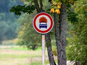 A road sign preventing entrance to vehicles carrying dangerous loads