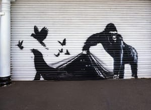 A new mural by elusive street artist Banksy is seen at the London Zoo, Tuesday, Aug. 13, 2024, in London. 