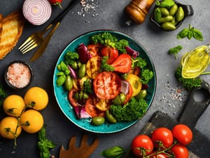 top view of a colorful bowl of fresh vegetables on a kitchen counter