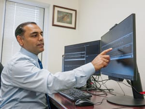 Dr. Roneil Malkani shows an example of pink noise being used to enhance slow brainwaves during deep sleep at the Center for Circadian & Sleep Medicine at Northwestern Medicine in Chicago