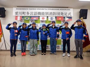 Members of the multilingual volunteer firefighter squad are seen in Aikawa, Kanagawa Prefecture.