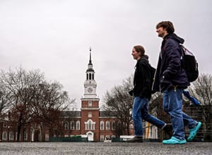 Students cross the campus of Dartmouth College, March 5, 2024, in Hanover, N.H.