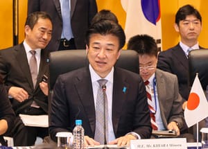 Japanese Defense Minister Minoru Kihara, center, speaks during a Japan-US-South Korea trilateral defense ministers meeting at Japan's defense ministry in Tokyo, on July 28, 2024. 