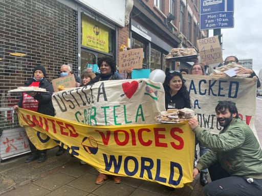 A group of people protest outside Devonshires Solicitors' offices in support of Gabriela Rodriguez.