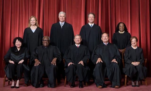 The Roberts Court (since June 2022): Front row (left to right): Sonia Sotomayor, Clarence Thomas, Chief Justice John Roberts, Samuel Alito, and Elena Kagan. Back row (left to right): Amy Coney Barrett, Neil Gorsuch, Brett Kavanaugh, and Ketanji Brown Jackson.